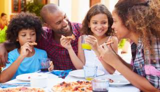 Family enjoying a meal together